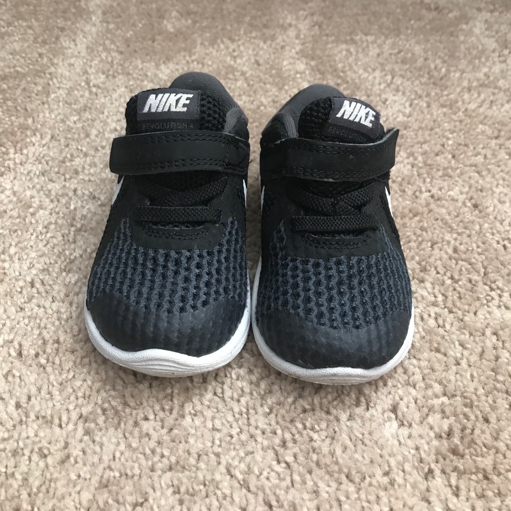 Lightly worn out Nike children shoes size 4C